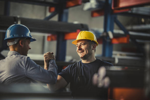 Workers collaborating in factory